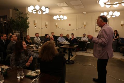 CEO Michael Castellana toasts the Broadview Wealth Management team.